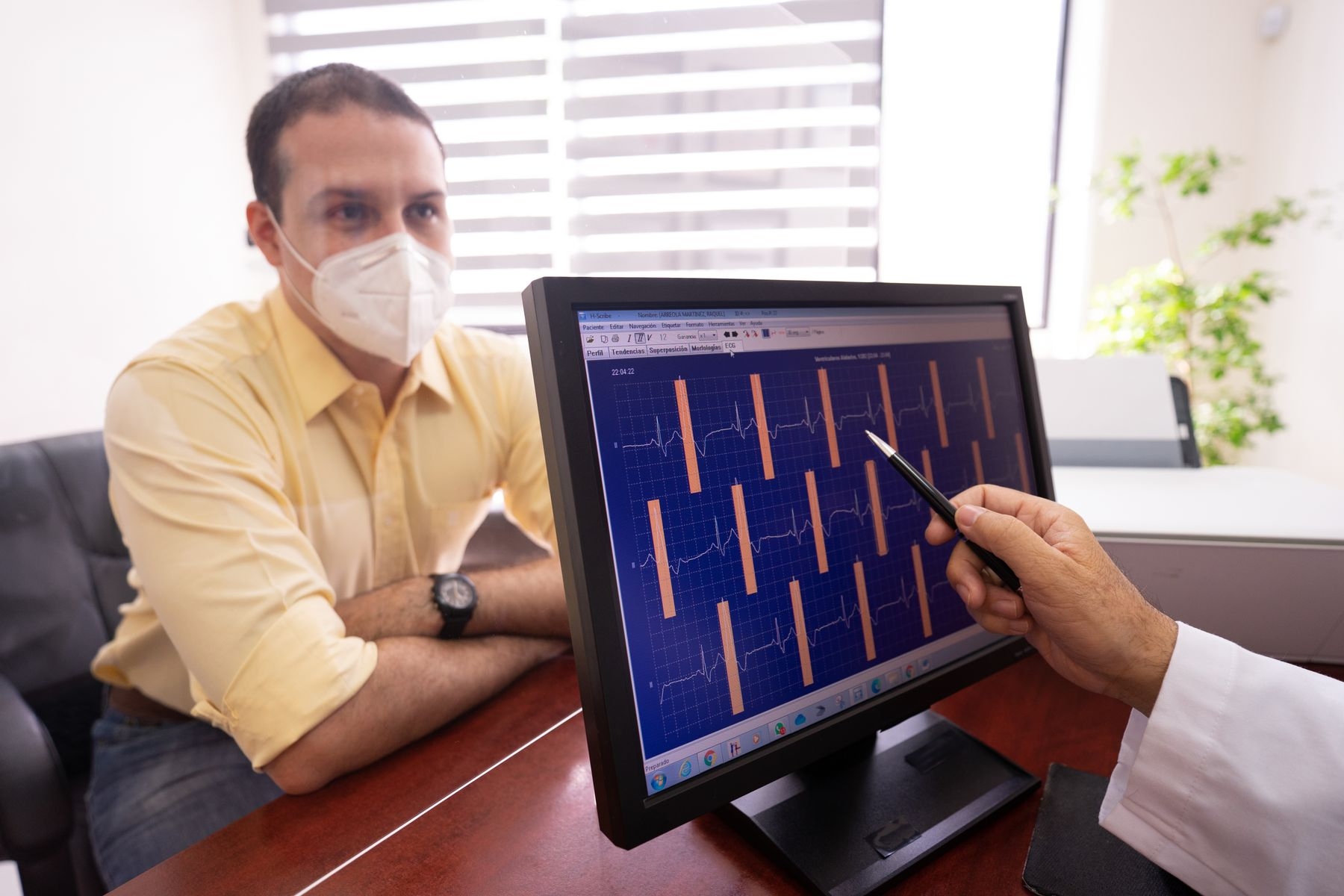 Best in class NYC Cardiologist reviewing cardiac evaluation at Umbrella Health